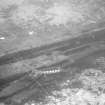 Collapsed timbers from the upper port side of the hull, which have gathered in the trench dug into the substratum by the keel. The white string on the left indicates Section A-A. Scale 1 foot.