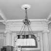 Interior.  Detail of ceiling light fitting in Drawing Room.