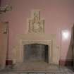 Interior. Ground floor, entrance hall, view of fireplace with coat of arms above