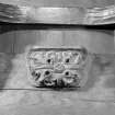 Poltalloch, St Colmba's Chapel.
Misericord (a). Detail of carving of seat.