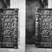 Stereoview of a carved panel from an oak cabinet.