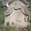 View of headstone showing helmet and dated 1735,  Longformacus Churchyard.