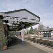 Detailed view from NE of awning attached to station offices on S-bound platform