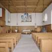 Interior.  From W towards communion table and pulpit