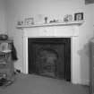 Interior. First Floor central block bedroom composition painted pine fireplace with register grate