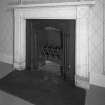 Interior. First Floor central block bedroom fireplace