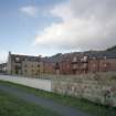 View from SW showing original building to left and new block to right