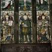 Interior. Detail of E stained glass window medieval tracery with stained glass by C E Kempe