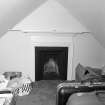 Interior. Attic. E Bedroom. Detail of fireplace