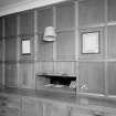 Interior. Dining room detail of panelling, serving hatch and original sideboard