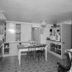 Interior. View of kitchen with some original cupboards