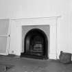 Interior. Detail of fireplace in rear bedroom in Victorian wing
