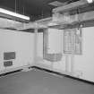 Interior view of 'Scottish Office bunker', national civil and military command and control centre, showing telephone switchboard and air ventilation trunking.