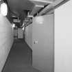 Interior view of 'Scottish Office bunker', national civil and military command and control centre, showing corridor with trunking.