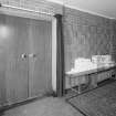 Interior. Entrance lobby. Doors to nave and decorativebrick panel