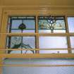 Interior.  Stair to balcony, detail of stained glass