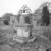 View of well and wrought iron wellhead