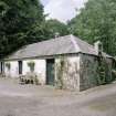 Rear (N) outbuildings. View from SE.