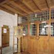 Interior. View of entrance porch showing glazed screen and tower stair door