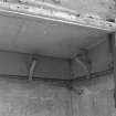 Interior. N range, first floor E room E wall detail of coathooks in wall cupboard