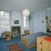 Interior. Fourth floor. Front bedroom showing fireplace and windows