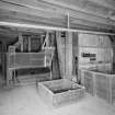 Interior. 2nd (top) floor of mill, general view from SSW, showing hatches to hoppers in foreground, with grain dressing machinery and bucket elevators and reciprocating sieves beyond