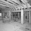 Interior. 2nd (top) floor of mill, general view from NE, with wooden grain silo visible to right