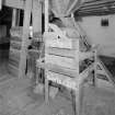 Interior. first floor of mill, view from NW of mill machinery towards S end of the mill