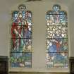 Interior. Detail aisle stained glass window entitled "GO AND DO THOU LIKEWISE"