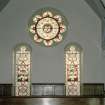 Interior. Detail of transept stained glass windows