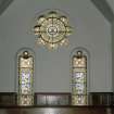 Interior. Detail of transept stained glass windows