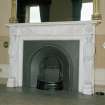 Interior. Drawing room Detail of white marble fireplace with caryatids and freize