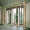Interior. Ante drawing room Detail of triple French windows onto the raised terrace flanked by columns with surviving beaded pelmet fringe