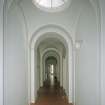 Interior. First floor View of S vaulted corridor from W