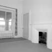 Interior. First floor View of portico  bedroom showing marble fireplace