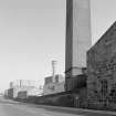 View of lower section of chimney from W