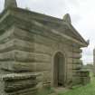 Oblique view of Mausoleum frontage from NE showing pediment and decorative stone work