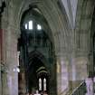 Interior.
View of aisle showing crucifix bearer at head of choiristers' procession passing by crossing area.