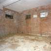 Interior view of bomb store shed showing location of 'safe working' notice.