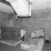 Interior view of gas decontamination building showing remains of air filtration unit and air extraction ducting.
