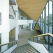 Interior. Elevated view of first floor stalls/foyer from SE