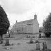 View from N showing setting in graveyard