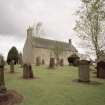 View from SW showing setting in graveyard