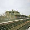 View of N-bound platform and station offices from SE