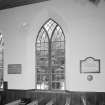 Interior. Detail of clear glazed pointed arch window