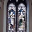Interior.
Detail of stained glass window of St John by Ballantine.