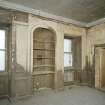 Interior.  Detailed view from NW showing mouldings and panelling of 1st fl room in warehouse ('Room 10')