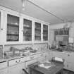 Interior, view of lower ground floor china pantry with original china cupboards