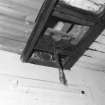 Interior, detail of hatch for hoist.