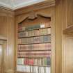 Interior. Octagonal library detail of panelling and bookcase